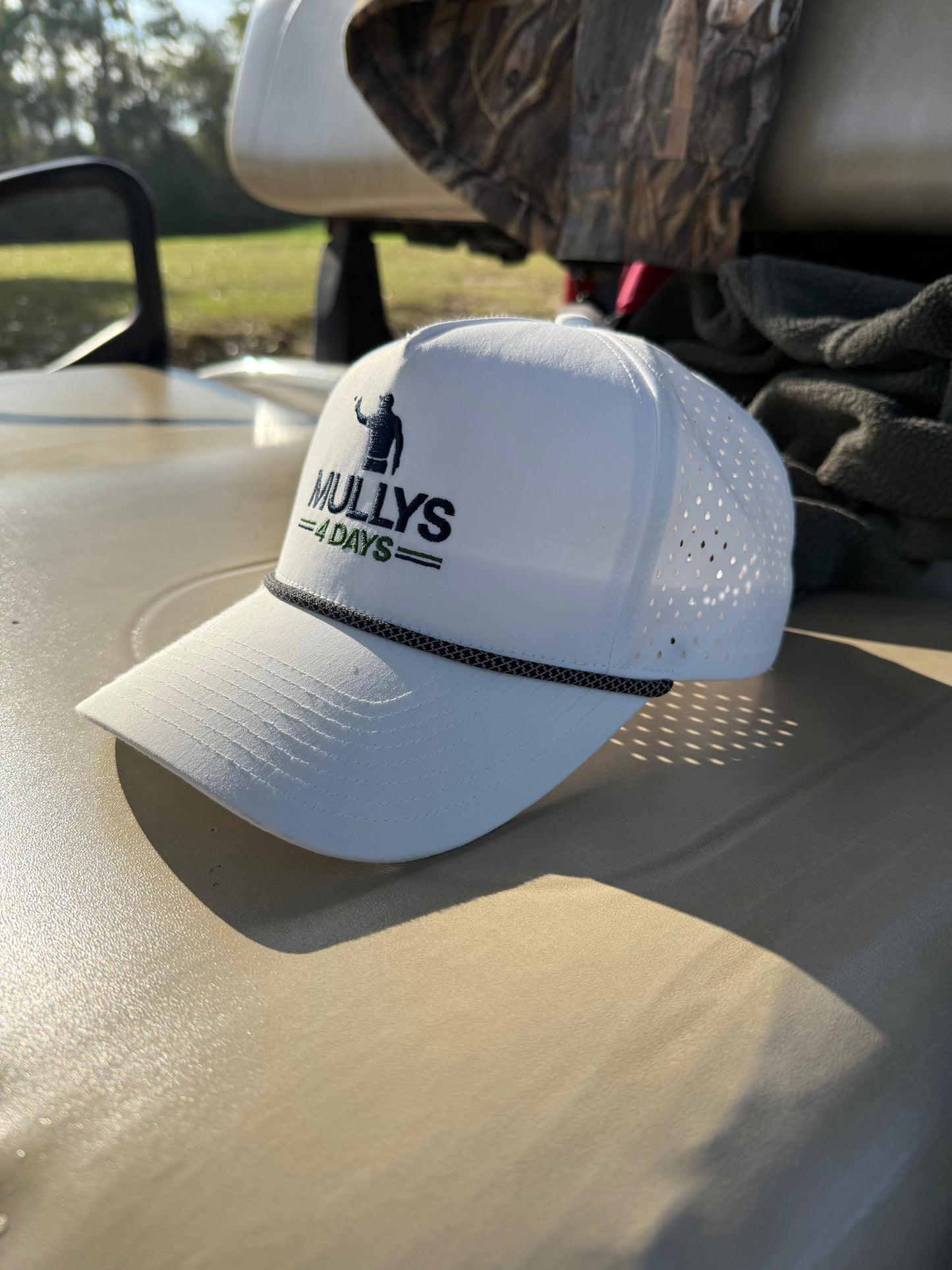 White Performance Rope Hat on Cart seat - Mullys 4 Days